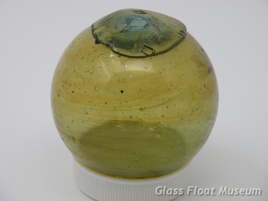 Amber Gold Swirls, Bluish Green Nubbin, 2 1/4 Inch